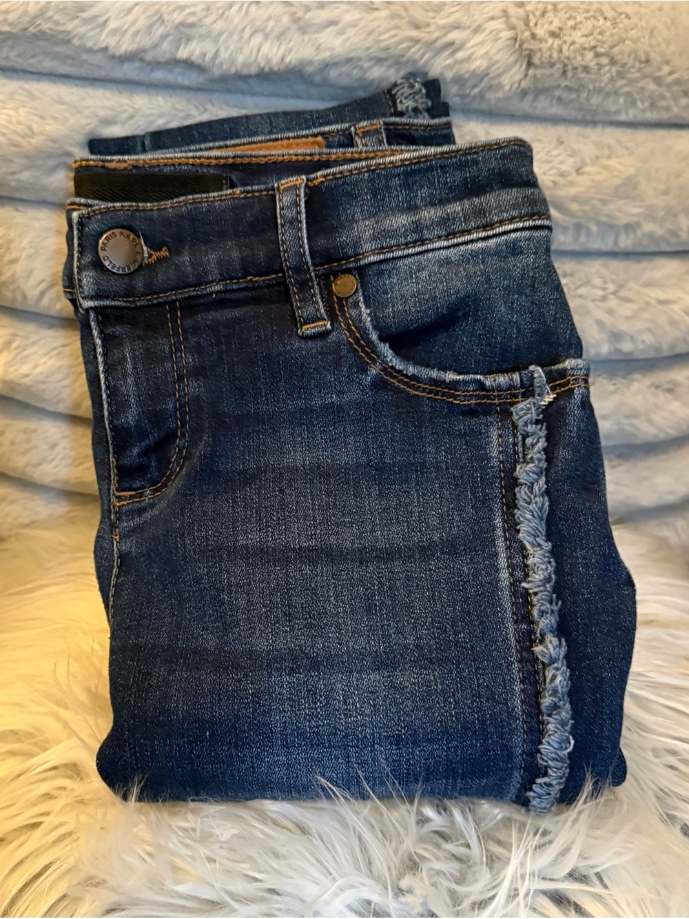 KARL LAGERFELD Dark Blue Distressed Denim Cropped Jeans with Frayed Side Trim.